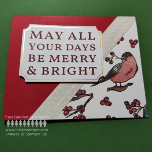 Holiday card showing a red-breasted bird in a diagonal strip half-square of paper in the lower right and the sentiment May all your days be merry and bright on the upper left